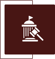 Icon of a gavel beside a courthouse with a flag on a dark background.